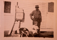 Peter Rilinger and grandson at Rilinger farmhouse